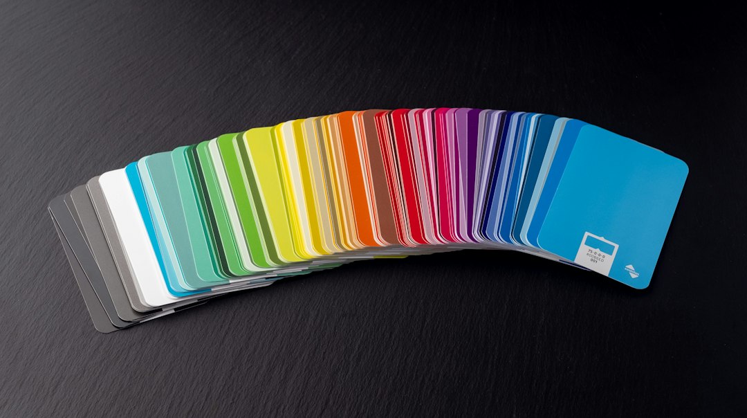 Close-up of card stock finishes and coatings for promo cards